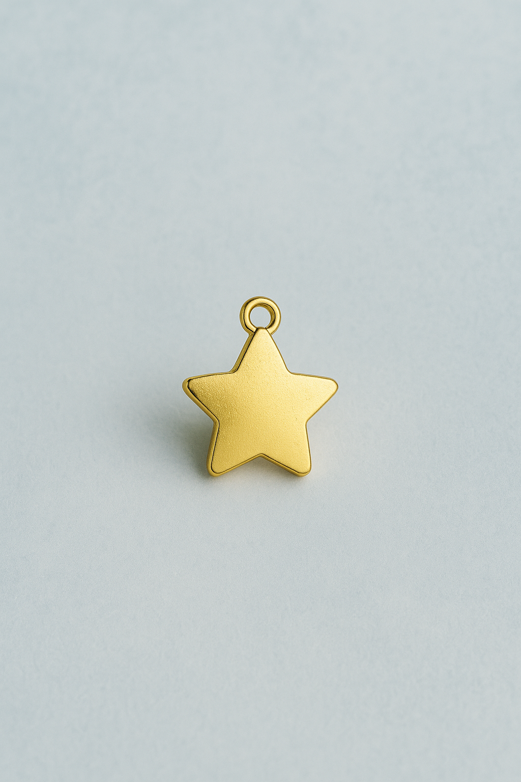 Charm estrella dorada